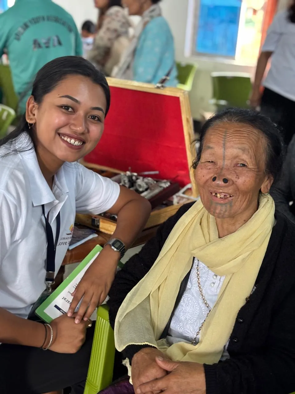 Volunteer guiding patient through different diagnostic zones.